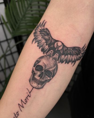 Intricately detailed black and gray tattoo by Alice Hope Tattoo, featuring a powerful eagle and menacing skull design.