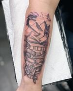 Stack of Books with Dragon and Rose