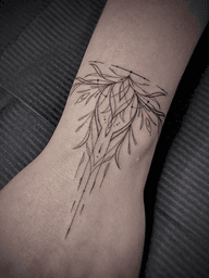 Delicate Abstract Botanical Wrist Tattoo