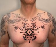 Central Abstract Chest Tattoo