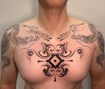 Central Abstract Chest Tattoo