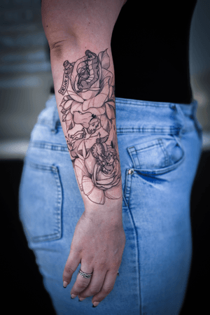 Stunning black and gray fine line tattoo by Steffan Eagle featuring Alice, rabbit, and caterpillar motifs.