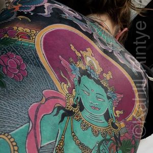 A glimpse of a Green Tara backpiece by Kahlil Rintye #greentara #backpiece #tattoocity #kahlilrintye #sanfransisco 