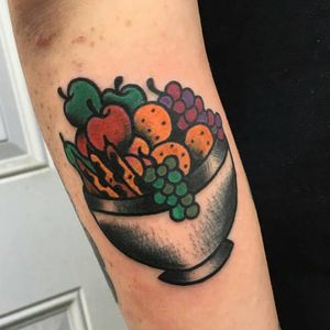 Such an awesome bowl of fruit tattoo by mmanarinotattooer