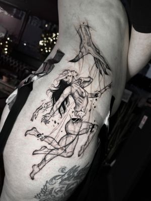 Human puppet rib tattoo