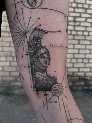 Fine line black and gray tattoo of Athena from Greek mythology, created with abstract geometric shapes by Olga Taşcı.