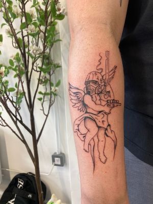 A striking illustrative tattoo by Robert Buckley-Warner featuring an angel and a hellghast soldier in a fine line style.