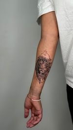 Fine Line Lion and Floral Tattoo