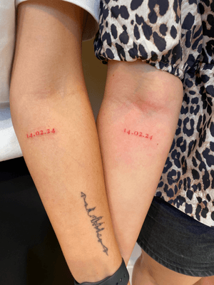 Simple and elegant small lettering tattoo by Alfonso Barberio, featuring matching dates.