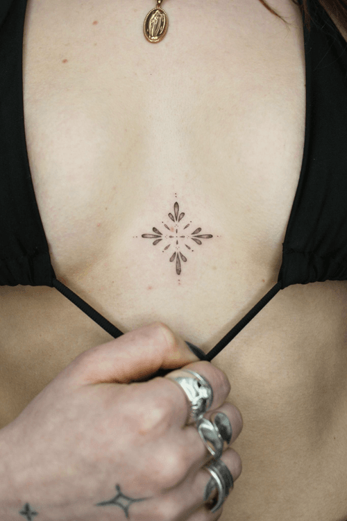 Starburst Chest Tattoo