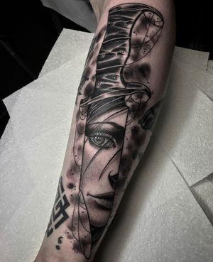 Custom, neotraditional black and grey knife with a lady face gap filler