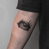 Eye with Tendrils Tattoo