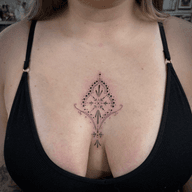 Sternum Ornament Tattoo