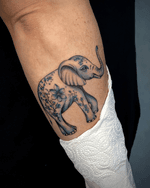 Elephant with Blue Flowers