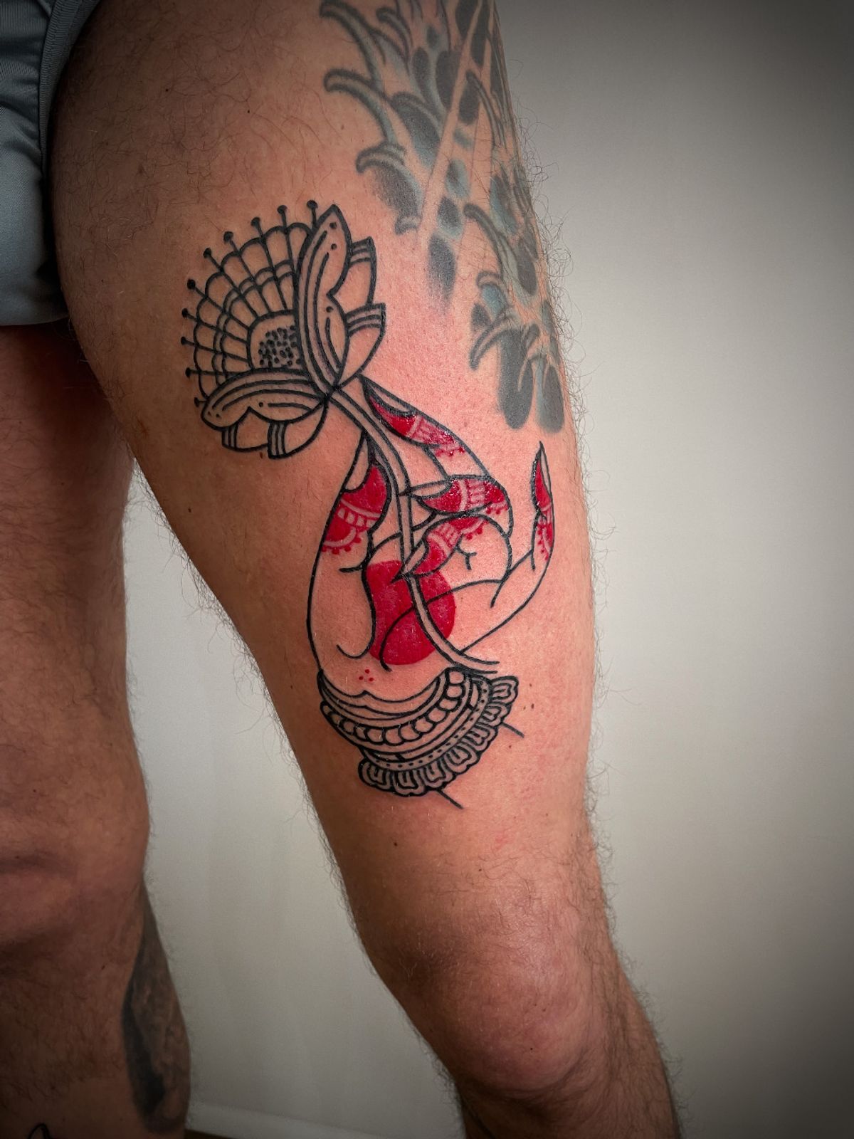 elegant leg tattoo