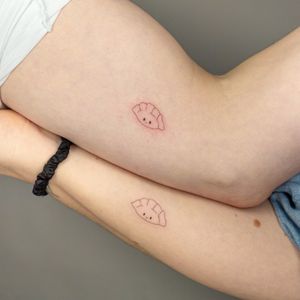 Adorable kawaii dumpling tattoo by Mika Tattoos, perfect for matching with your loved one. Delicately designed in fine line style.