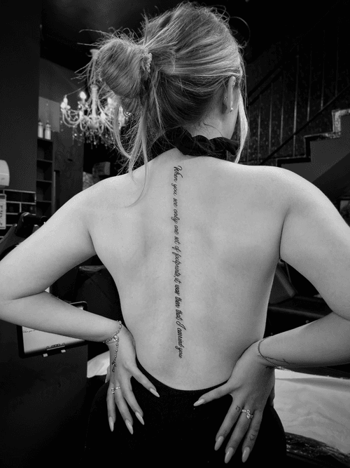Spine Lettering Tattoo