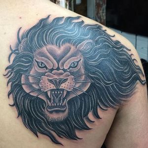 lion tat by glessnertattoo