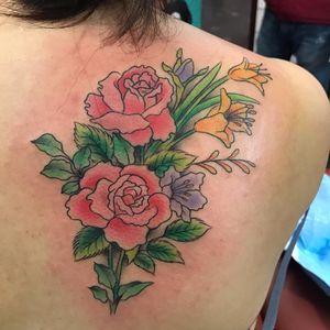 A beautiful flower shoulder piece done by smithy_btm #roses #flowertattoo #baltimoretattooartist #marylandart #shouldertattoo #colortattoo #bmoreart