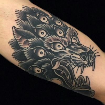 his wolf has more than one eye on you! By our very own big bad wolf, andreafurci #tradworkers#london #wolftatto #eastlondontattoo #wolf #londontattoo #animaltattoos #besttraditionaltattoos #blackworktattoo #oldlines #shoreditch
