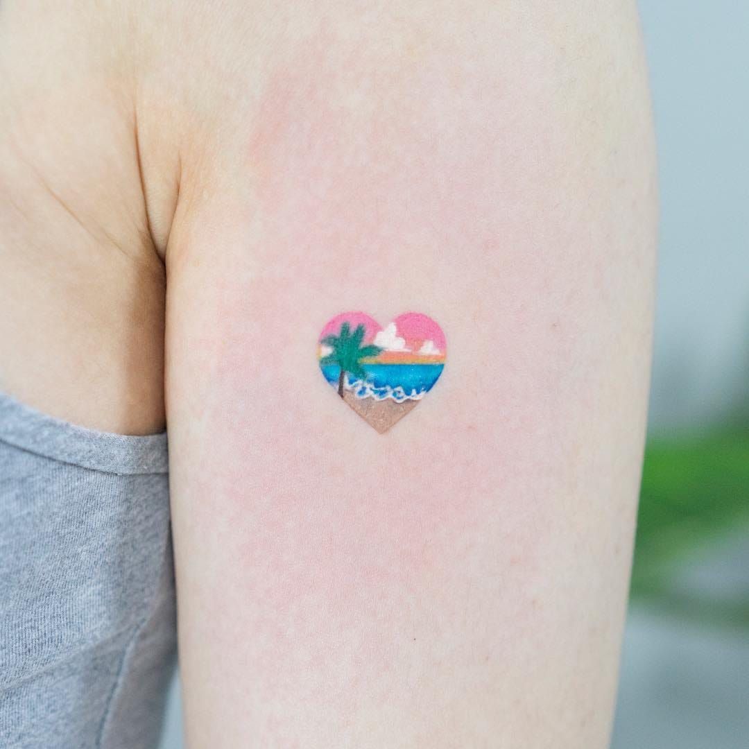 Minimalist beach sunset tattoo in fine line