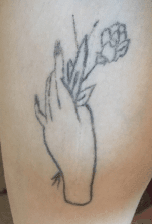 Shitty unfinished hand holding flowers 