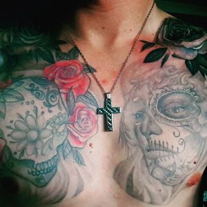 #chestpiece #chesttattoo #skulltattoo #roses #dayofthedeadtattoo #dayofthedeadgirl #cross #tattoo #inked 