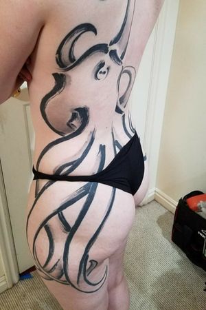 Side view of octopus tattoo Done by Chase Johnson 