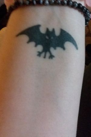 Bat on left wrist area