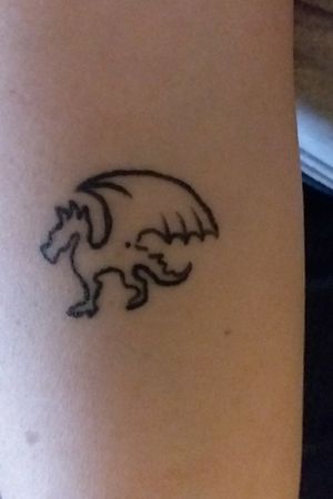 Dragon on right forearm