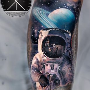 Tattoo by Chris Rigoni #ChrisRigoni #realism #realistic #hyperrealism #black gray #color #abstract #forms #mashup #astronaut #moon #moon landing #space suit #solar system #galaxy #stars #plane #saturn
