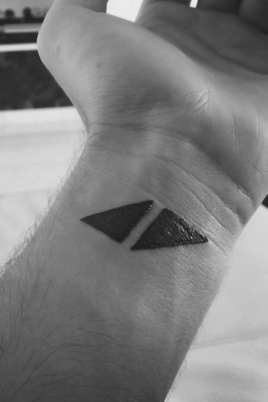 avicii symbol triangles tattoo