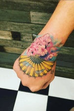 Custom colour hand tattoo by Artist Dhruv 