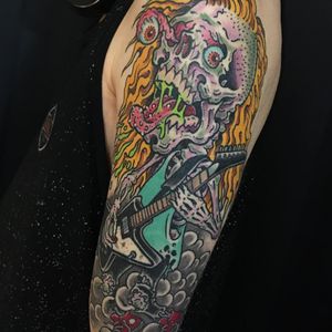 Metal mania tattoo by Joel Marlo #JoelMarlo #metaltattoos #color #newschool #newtraditional #skeleton #skull #guitar #metal #musician #musictattoos #zombie