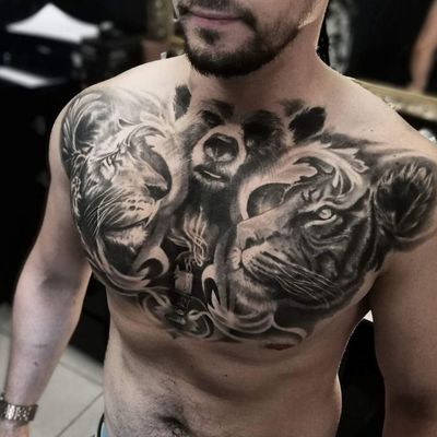 One of my favourites pieces that I did Fully healed up. Did it for 15hrs. Bookings: crimson.tide.tattoo@gmail.com #liontattoo #beartattoo #fullchest #tigertattoo #chestpiece #chesttattoo #animaltattoo #filigreetattoo #igorsto #realistic #realism #blackandgreytattoo #blackandgreyrealism www.tattooinlondon.com🐅