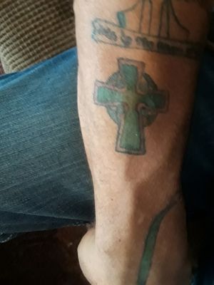 Celtic cross. 15 year old Madison villareals first tattoo. 
