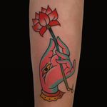 Holding a lotus flower. Tattoo by Alex Zampirri #AlexZampirri #Mudratattoos #color #mudra #Buddhist #buddha #symbols #hand #lotus #flower #floral #eye #thirdeye #allseeingeye