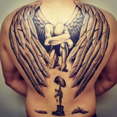 half demon half angel wings tattoo