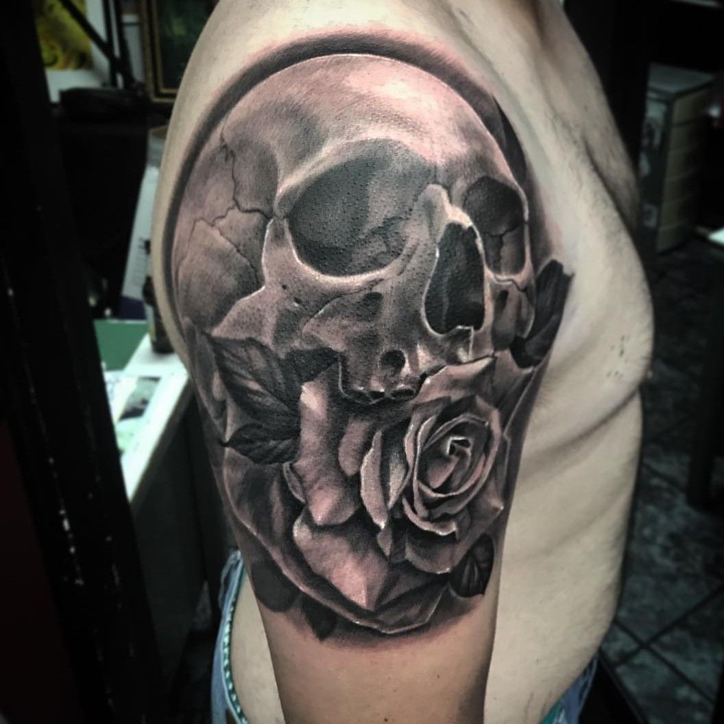 Black and grey skull tattoo  Skull tattoo design Skull sleeve tattoos Skull  tattoos