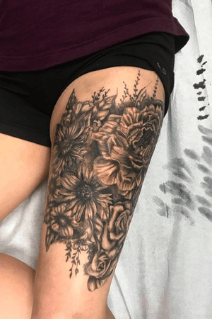 Huge black and gray flower piece. #flowers #blackandgray #thightattoo #flower #tattooart 