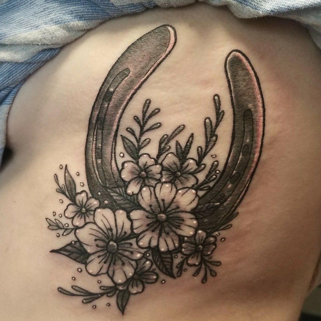 Horseshoe  Flowers Tattoo by Irit Gamburg