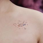 Galaxy fish. Tattoo by Saegeem #saegeemtattoo #fishtattoos #linework #minimal #illustrative #watercolor #small #cute #saturn #stars #moon #fish #rainbow #dotwork