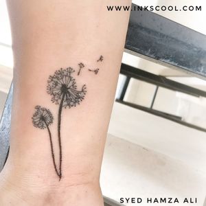 Delicate dandelion tattoo designed and tattooed by Tattoo Artist Syed Hamza Ali at INKSCOOL Tattoo Training Institute And Studio Pune India ™