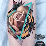 Traditional meets realistic. Tattoo by Chris Rigoni #ChrisRigoni #mashuptattoos #color #traditional #realistic #realism #dotwork #shapes #rose #floral #flower #leaves #nature