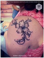 Gladiolus flower tattoo, designed and tattooed by Tattoo Artist Syed Hamza Ali at INKSCOOL Tattoo Training Institute And Studio Pune India ™