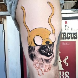 Adventure Time meets wildcat. Tattoo by Mat Rule #MatRule #mashuptattoos #mashup #AdventureTime #cartoonnetwork #cartoon #Finnandjake #dog #cat #realism #realistic #newschool
