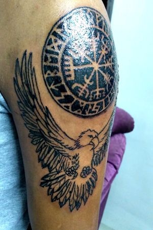 Dark black tattooAncient compass with eagle