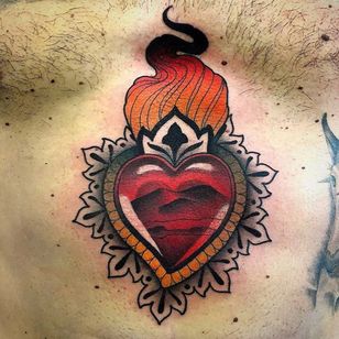 Burning Desire. Tattoo by Mattia Faggiano #MattiaFaggiano #sacredhearttattoo #color #traditional #heart #fire #desert #landscape #lace #pattern #sacredheart #love