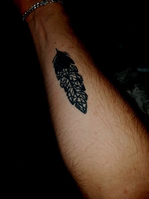 geometric feather tattoo simple black & white designe.