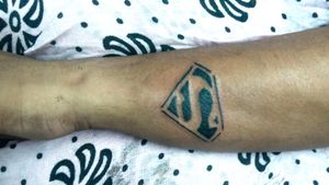 Black tattoo Superman symbol